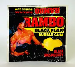 Vintage 1985 Amurol RAMBO Borsa in Gomma Flak Nero 5,5 Contenitore Caramelle SIGILLATO - Foto 1 di 3