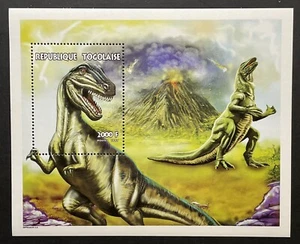 HOJA DE RECUERDO DE SELLOS DE DINOSAURIOS TOGO 1998 MONTADA SIN MONTAR O NUNCA MONTADA ANIMALES PREHISTÓRICOS TIRANOSAURIO - Imagen 1 de 1