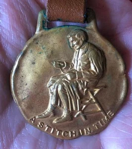 ADVERTISING "A.E. ANDERSON & CO. TAILORS CHICAGO" WATCH FOB A STITCH IN TIME" - Picture 1 of 1