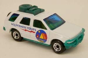 Matchbox 1990-94 Isuzu Rodeo 4-türig weiß mit Bürstenschutz und Dachträger Maßstab 1:52 - Bild 1 von 2