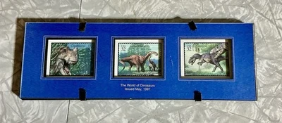 Vintage 1997 “The World Of Dinosaurs” Stamp Collection - Image 1 of 3
