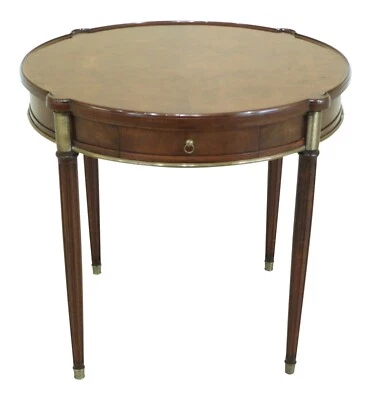 F48832EC: ESTILO MASION JANSEN Mesa ocasional redonda francesa Luis XVI de nogal Foto 1 de 4