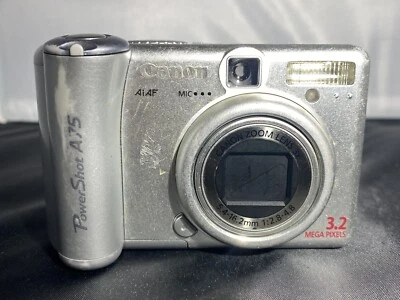 Canon Powershot A75 Digital Camera 3.2 MP 3x  Zoom Silver  FOR PARTS OR REPAIR - Image 1 of 4