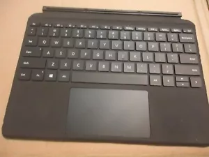 Microsoft Surface keyboard Model 1840- missing the two holding tabs. - Picture 1 of 11