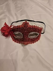 red masquerade mask Mardi Gras edged with ribbon flower on side - Picture 1 of 3