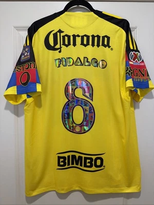 Camiseta Alvaro Fidalgo #8 Masculina EXTRA GRANDE Adidas Club America X Pac-Man Home  - Imagem 1 de 4