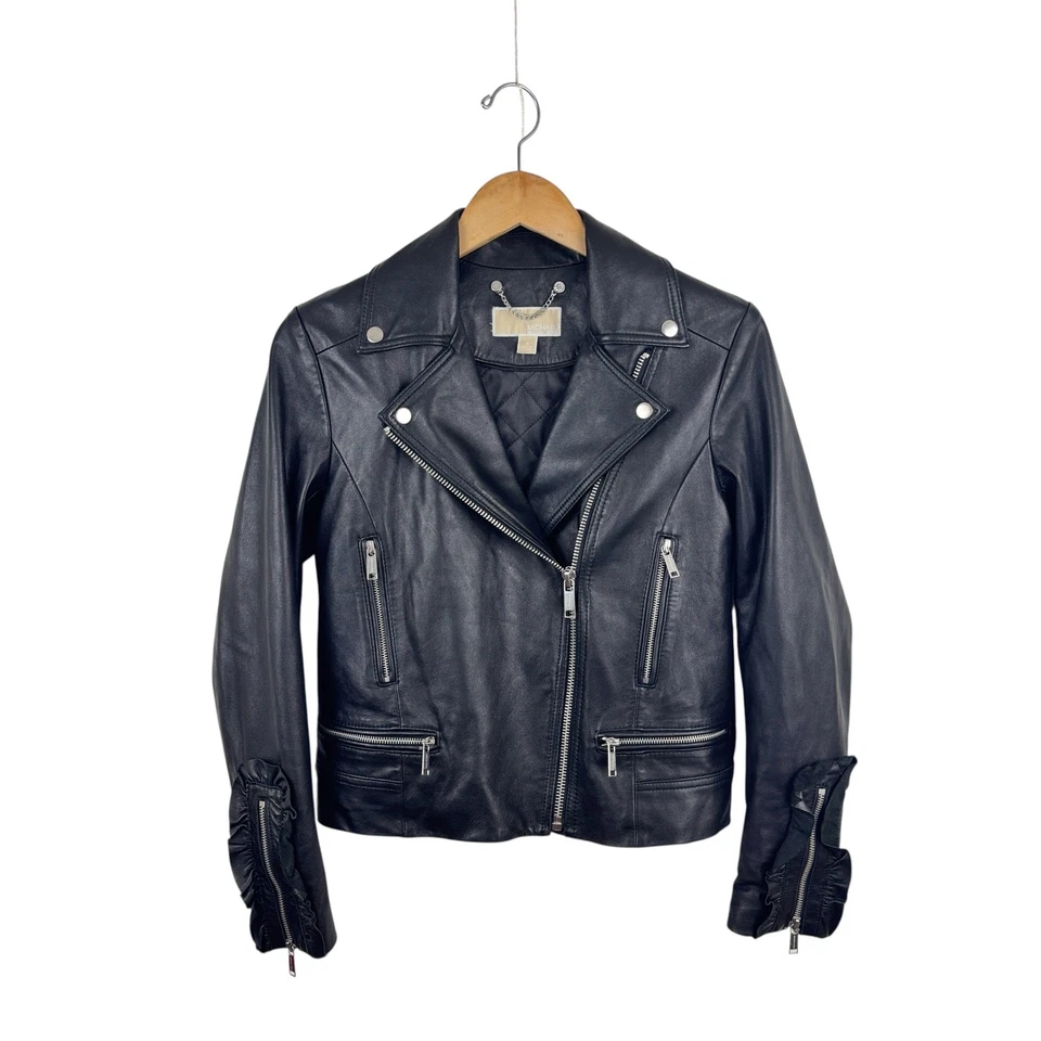Chaqueta de moto Michael Kors de cuero de cordero negro con volantes para mujer S Foto 1 de 4