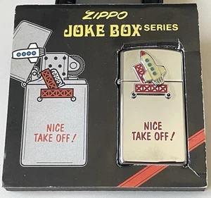 1996 SLIM ZIPPO FEUERZEUG 'JOKE BOX' SERIE TRICKFEUERZEUG 'NICE TAKE OFF', NOS - Bild 1 von 9