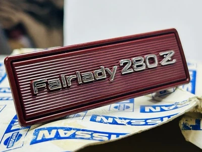 Nissan FairladyZ Center Console Emblem Red Datsun 280ZX 280Z S130Z S30Z NOS NEW - Image 1 of 4