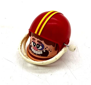 Vintage Tomy Wind Up Football Player Toy Red Helmet Yellow Stripe 70s Singapore - Bild 1 von 4