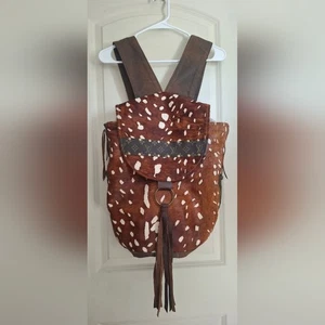 Mochila de cuero de vaca marrón y blanco con borla tira LV a través de gitana - Imagen 1 de 8