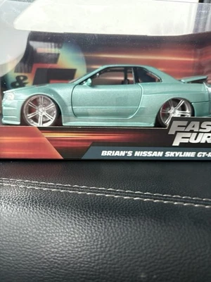 Vehículo fundido a presión Nissan Skyline GTR R34 Fast & Furious de Brian 1:24 Jada Toys  Foto 1 de 4