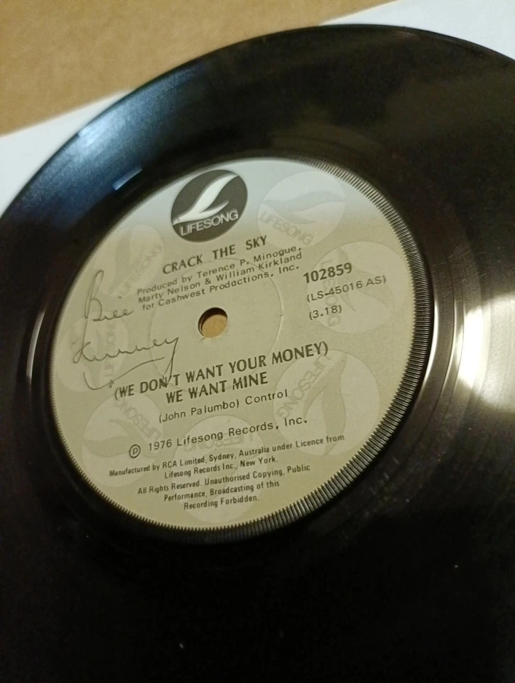 Crack The Sky ‎– (We Don't Want Your Money) We Want Mine   7"    VG+ - Image 1 of 1