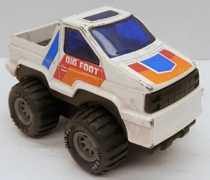 Camión monstruo vintage Arco (marca) Ford Aerostar BIGFOOT fricción push-N-Go - Imagen 1 de 2