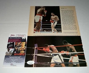 Larry Holmes Heavyweight Champ signed Boxing Magazine Page autographed 9 JSA - Bild 1 von 2