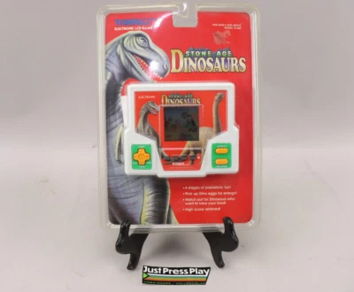 1994 Tiger Electronics Stone Age Dinosaurs Handheld LCD Game New Factory Sealed! - Image 1 of 4