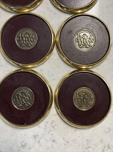 4 Solid BRASS and Brown LEATHER Union Colony Bank COASTERS with CORK Bottom - Picture 1 of 4
