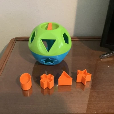 Tupperware Forma O Bola Juguete Clásico Azul Verde Formas Clasificador Niño Pequeño 4 Formas Foto 1 de 4
