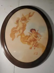 Quadro ovale con cornice Cupido in volo - Foto 1 di 2