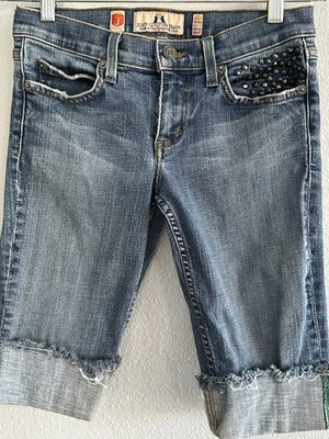 Pantalones de mezclilla capri Juicy Couture Y2K talla 26 con tachuelas bolsillo enrollado dobladillo crudo EE. UU. Foto 1 de 4