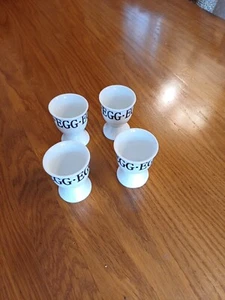 4 Egg Cups, white with black EGG logo - Picture 1 of 5