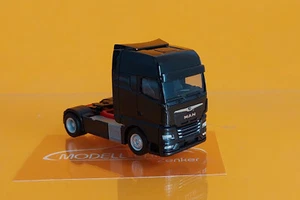 Herpa 311922-003 MAN TGX GX Zugmaschine schwarz 1:87 NEU Modell - Bild 1 von 2