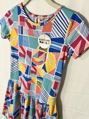 😍NWT Girls DotDotSmile Dress Size 8/10 Multi Geo Print With Pom Poms - Image 1 of 4