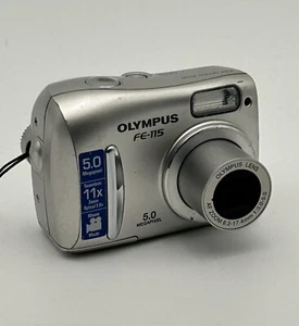 Olympus FE FE-115 5.0MP Digital Camera Silver TESTED Working W/Issues FOR PARTS - Picture 1 of 16