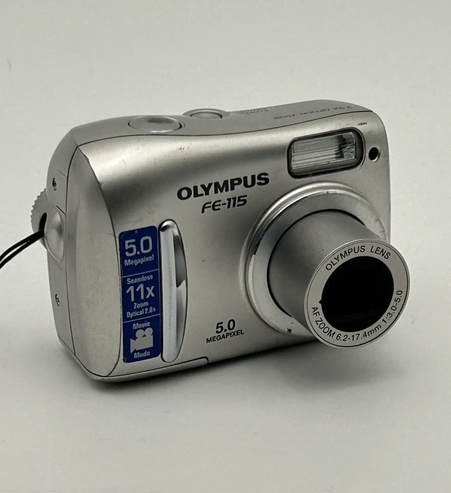 Olympus FE FE-115 5.0MP Digital Camera Silver TESTED Working W/Issues FOR PARTS - Image 1 of 4