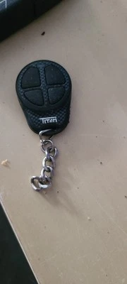 TESTED - TITAN brand T90RT-E 4 button remote start fob - Image 1 of 4