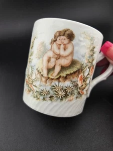 Antique Porcelain Demitasse Cup – Cherub Kiss Scene – Embossed Swirl – Victorian - Picture 1 of 9