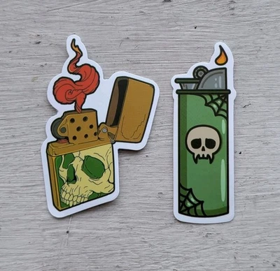 Encendedores para fumar divertidos con calaveras pegatinas verdes lote de 2 piezas Foto 1 de 3
