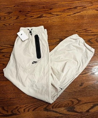 Nike Tech Woven Oversized Pants Men’s Large Light Orewood Black HM7158-104 NWT - Image 1 of 4