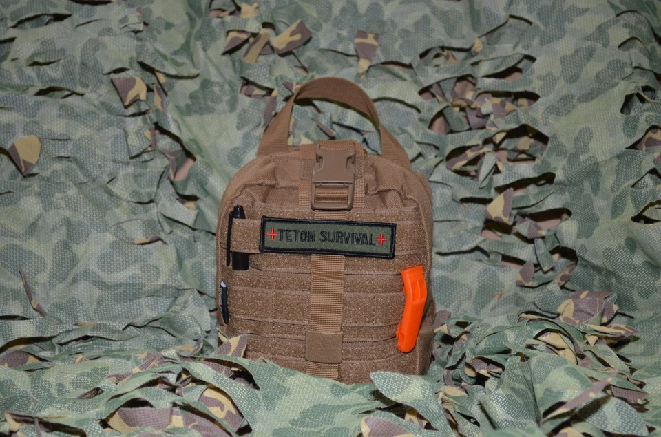 Estándar - Kit de primeros auxilios mediano (MFAK) bolsa táctica de supervivencia al trauma - almacenada Foto 1 de 4