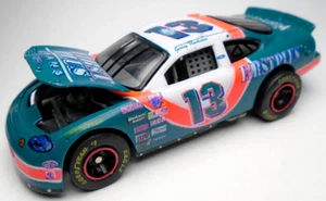1996 RACING CHAMPIONS FORD TAURUS #13 JERRY NADEAU FIRST PLUS GREEN 1:64 NASCAR - Picture 1 of 7