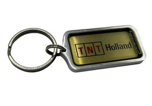 Vintage TNT Holland Trucking Logistik Lieferservice Metall Gold Schlüsselanhänger - Bild 1 von 8