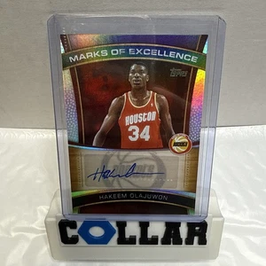 Hakeem Olajuwon 2025-2026 Topps Basketball Holo Auto Marks of Excellence - Bild 1 von 6