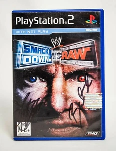 WWE SMACKDOWN! VS. RAW - PLAYSTATION 2 | DAVE BATISTA SIGNED - Picture 1 of 5