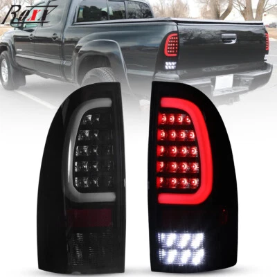 Luces traseras de tubo LED de humo negro para Toyota Tacoma 2005-2015 lámparas de freno L&R Foto 1 de 4