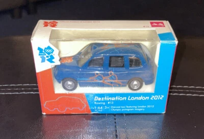 Destination London 2012 Rowing- #13 Die-cast taxi corgi toy boxed. 1.64 scale. - Image 1 of 4