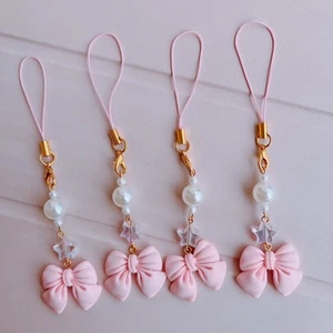 Handmade Pink Bow Charm – Cute Phone Strap / Bag Accessory with Pearl & Star - Photo 1 sur 5