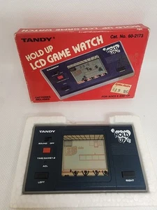 Tandy Hold Up LCD Game Watch Portatile Gioco Elettronico Vintage 1983 Mini Gioco - Foto 1 di 18