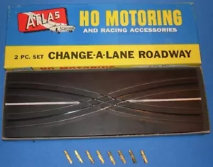 ATLAS HO SCALE SLOT AUTO PISTA CAMBIO CORSIA 1228 NUOVO CON SCATOLA E 8 GUARNIZIONI TIPO II - Foto 1 di 2