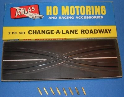 ATLAS HO ESCALA SLOT CAR TRACK CHANGE A LANE 1228 CASI NUEVO EN CAJA Y 8 ENSAMBLADORES TIPO II Foto 1 de 2