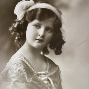 RPPC Postal ANTIGUA PRINCIPIOS DE 1900 HERMOSA CHICA FELIZ AÑO NUEVO STASTNY NUEVA - Imagen 1 de 5