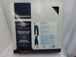 Pantaloni motosega Husqvarna originali OEM - taglia 32/34 M/M - 582052802 - Foto 1 di 2