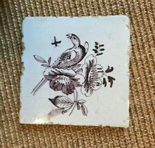 ANTIQUE 18C DUTCH DELFT MANGANESE TILE FEATURING A BIRD AND A BUNCH OF FLOWERS