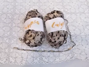 LOT 2 SWTC "CALYPSO" 1/4"  RIBBON YARN BLACK/SHINY TAUPE 1 3/4 OZ CHINA - Picture 1 of 4