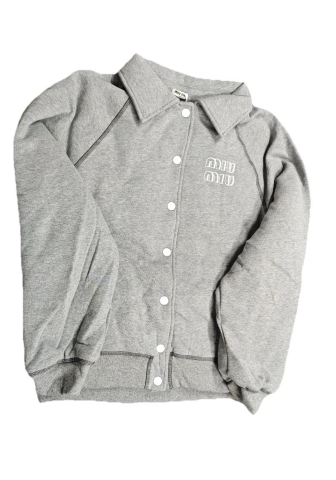 Chaqueta universitaria Miu Miu gris con botones Foto 1 de 2