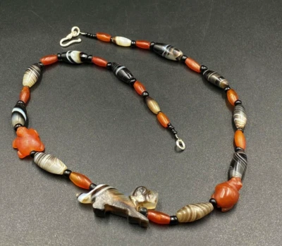 Old Banded Agate beads with tiger figure carved bead from Pyu south east Asia - Image 1 of 4